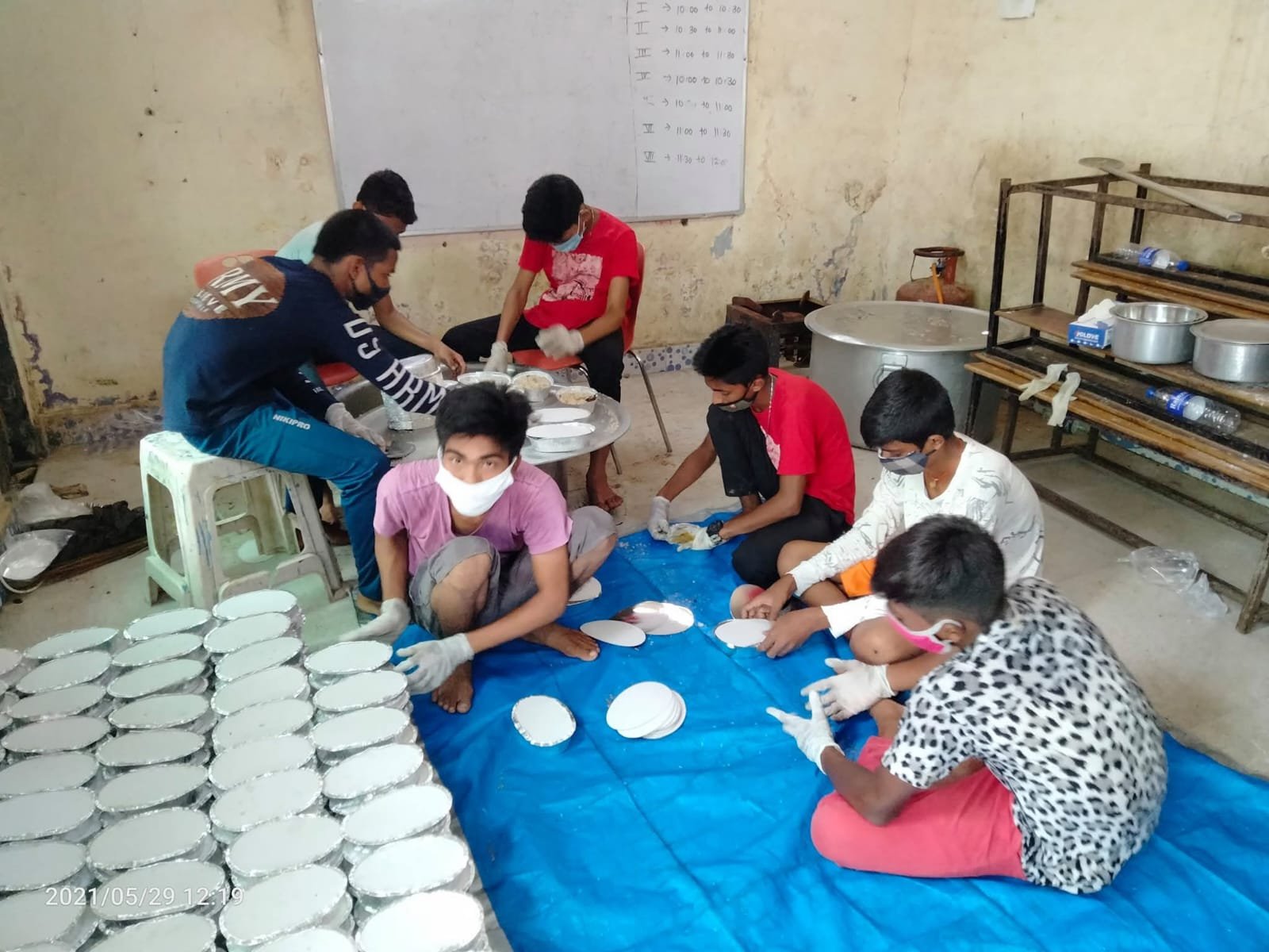 Volunteers Packing Food Containers